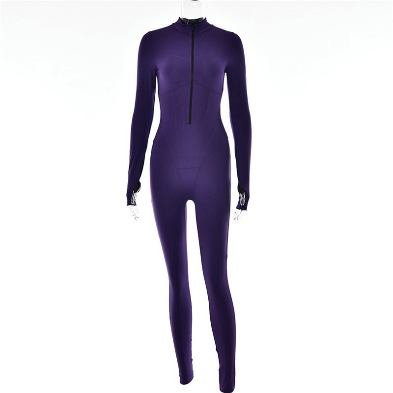 Purple long sleeve jumpsuit with front zipper, designed for sporty activities, featuring a sleek silhouette and stretchy fabric.
